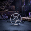 Pentagram that is inverted. Simple pewter necklace with black cord for easy adjustment.