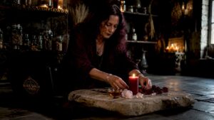 Woman arranging ritual tools for love spell