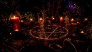 Luciferian ritual altar with candle and sigil